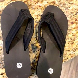Black flip flops